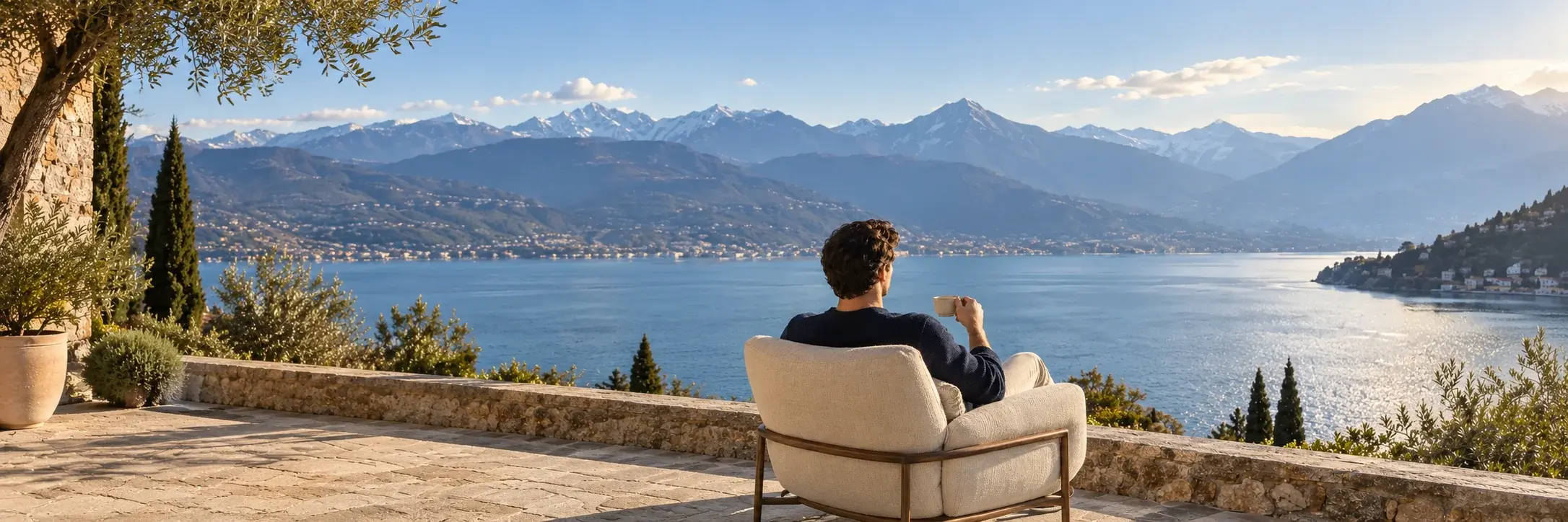A quiet moment with a cup of coffee, looking out over an alpine lake